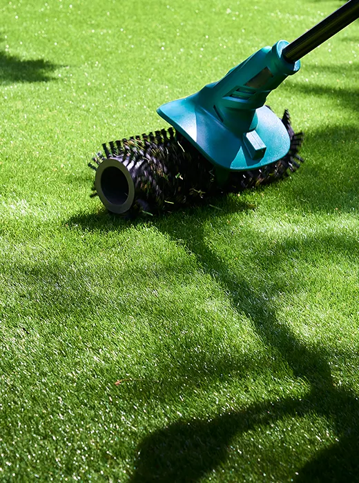 Artificial Grass Maintenance brushing